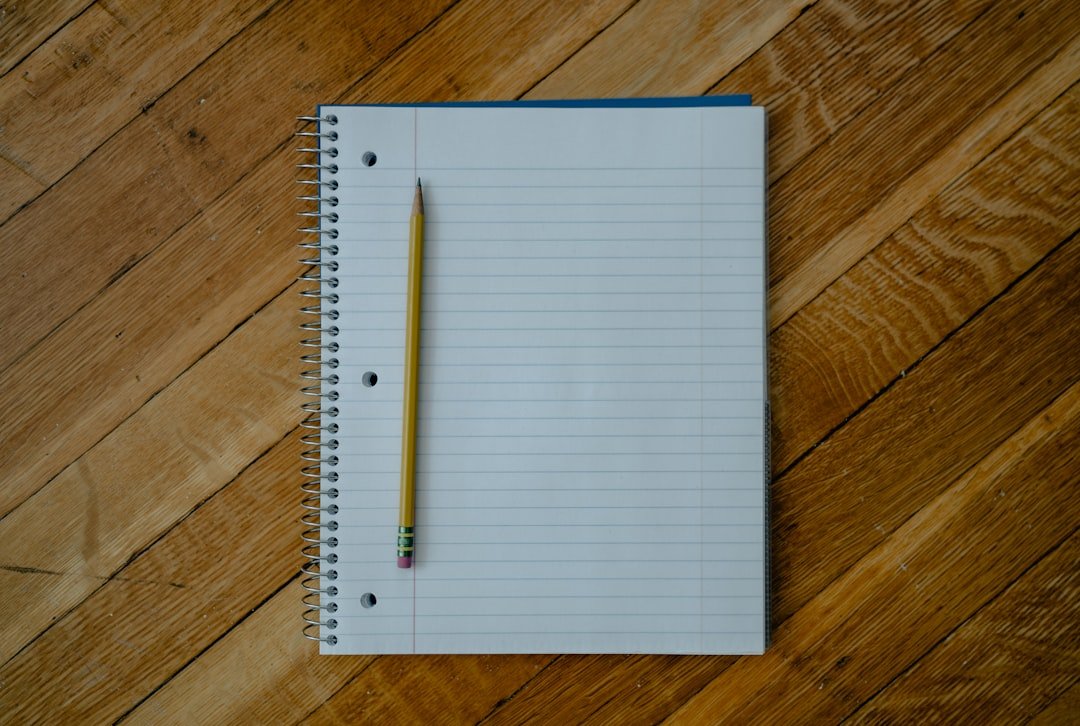 open book pen notebook studying