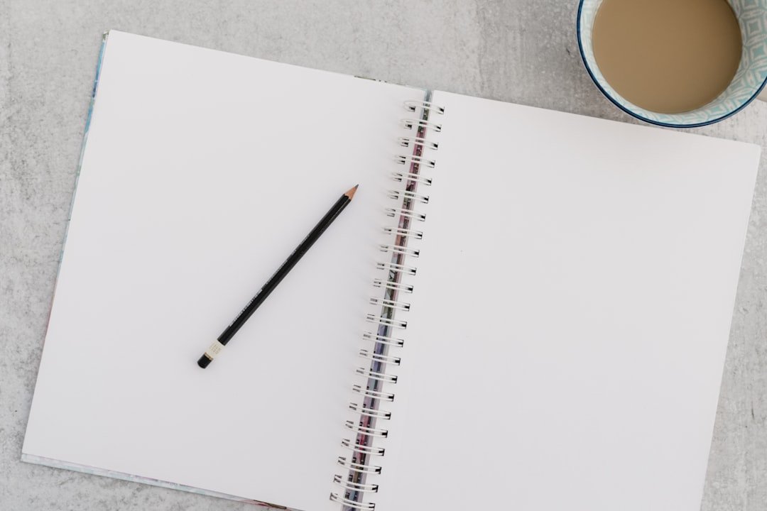 essay notebook pencil
