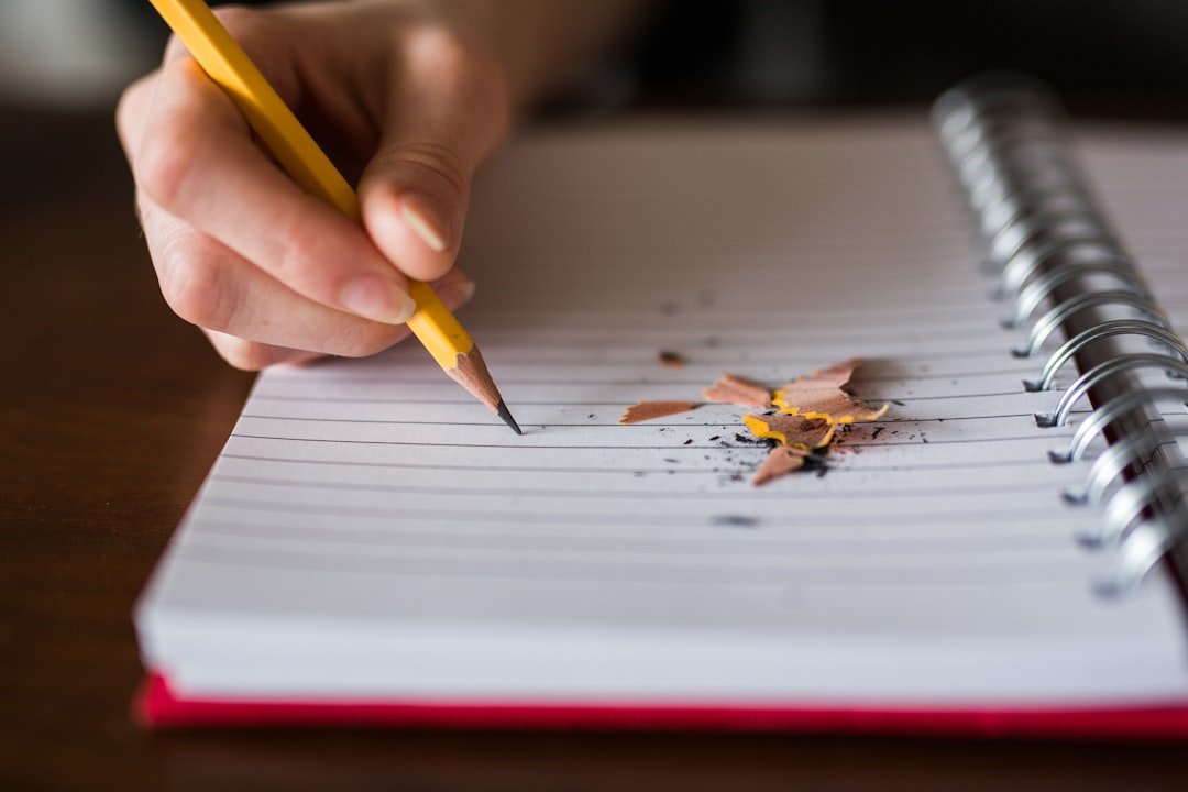 student writing notebook