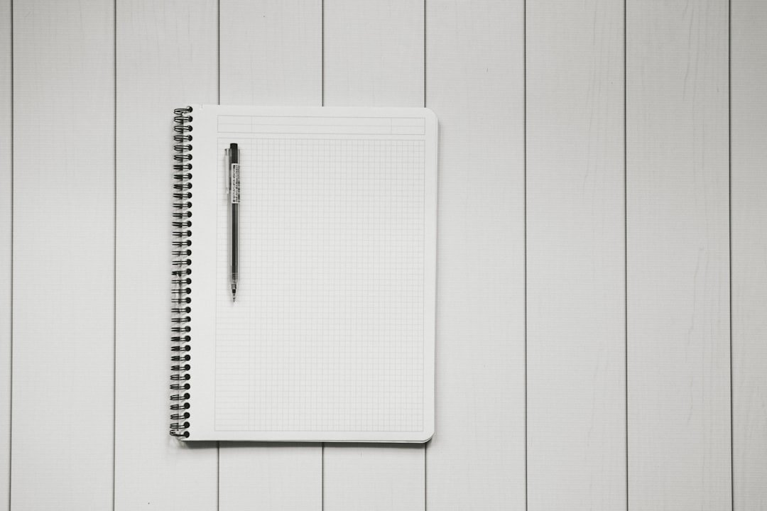 notebook pen academic papers