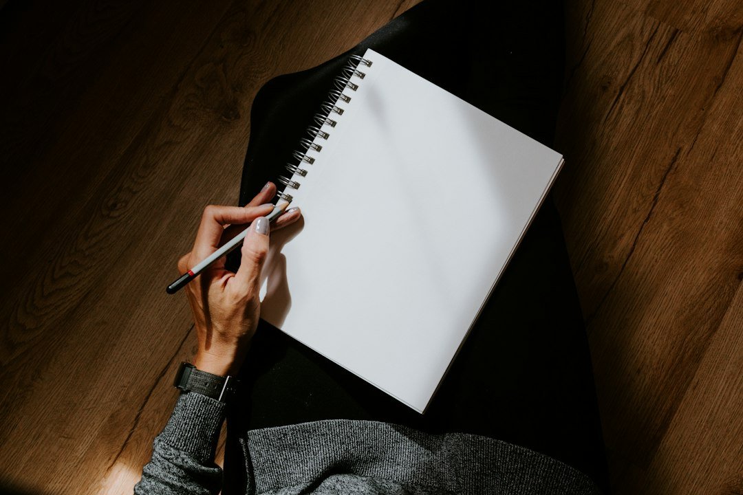 student writing notebook