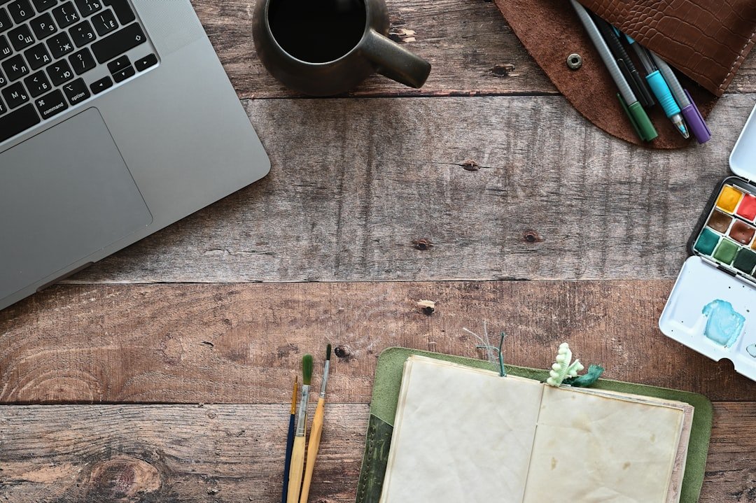 student writing desk notebook pen