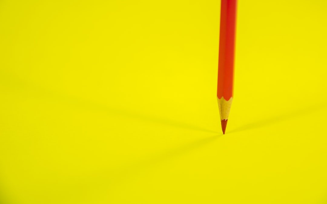 teacher marking red pen essay